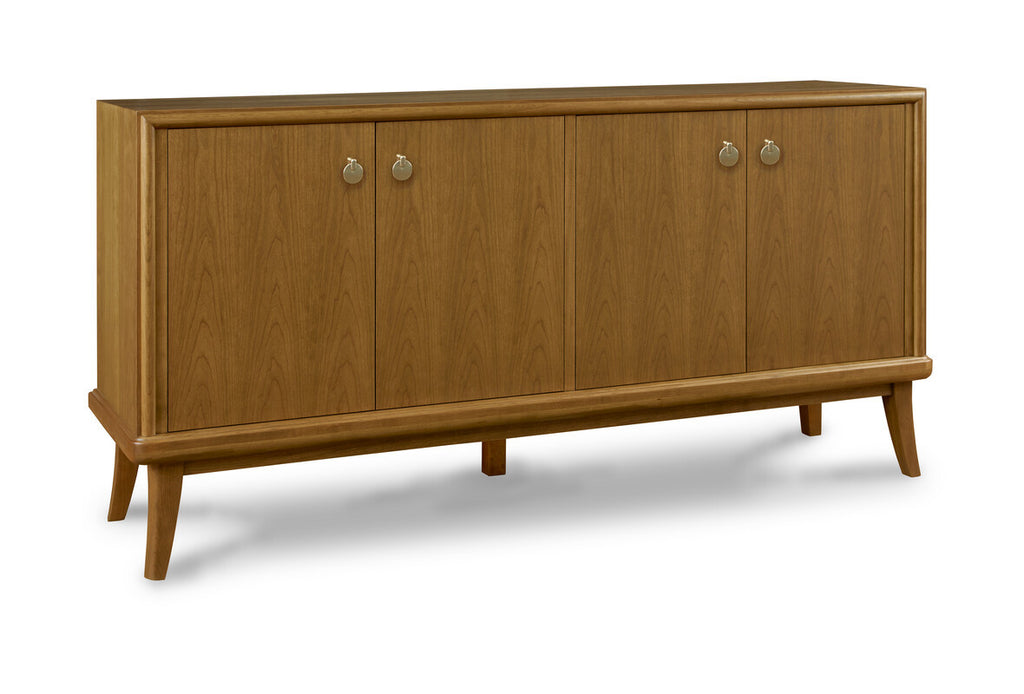 Wooden sideboard with four doors on a white background