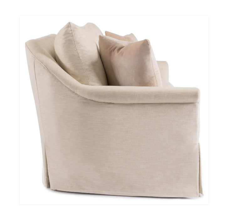 Beige sofa with cushions on a white background