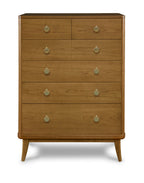 Wooden dresser with multiple drawers and round handles on a white background