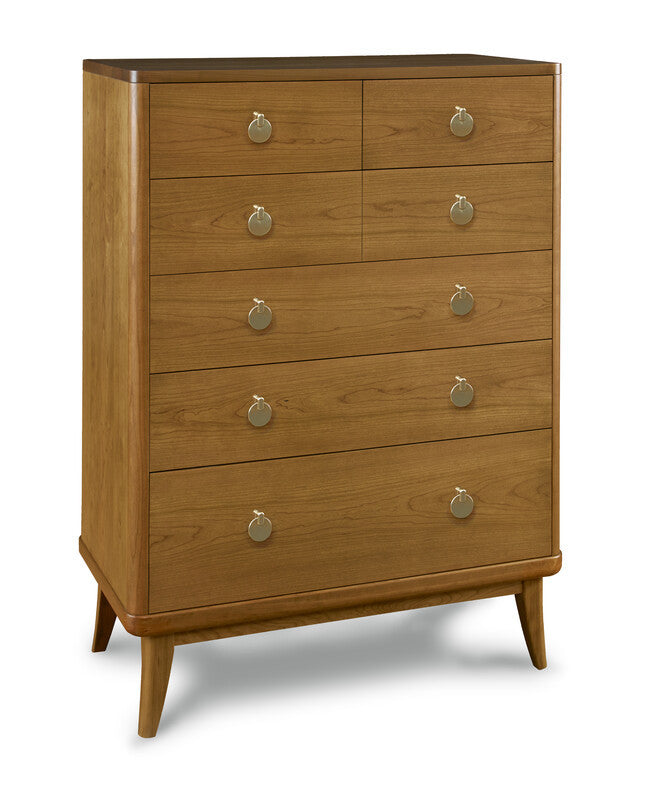 Wooden dresser with six drawers and round metallic handles on a white background