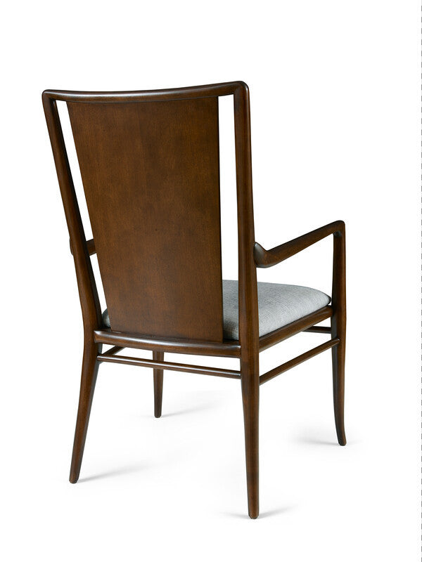 Wooden chair with a gray cushion on a white background