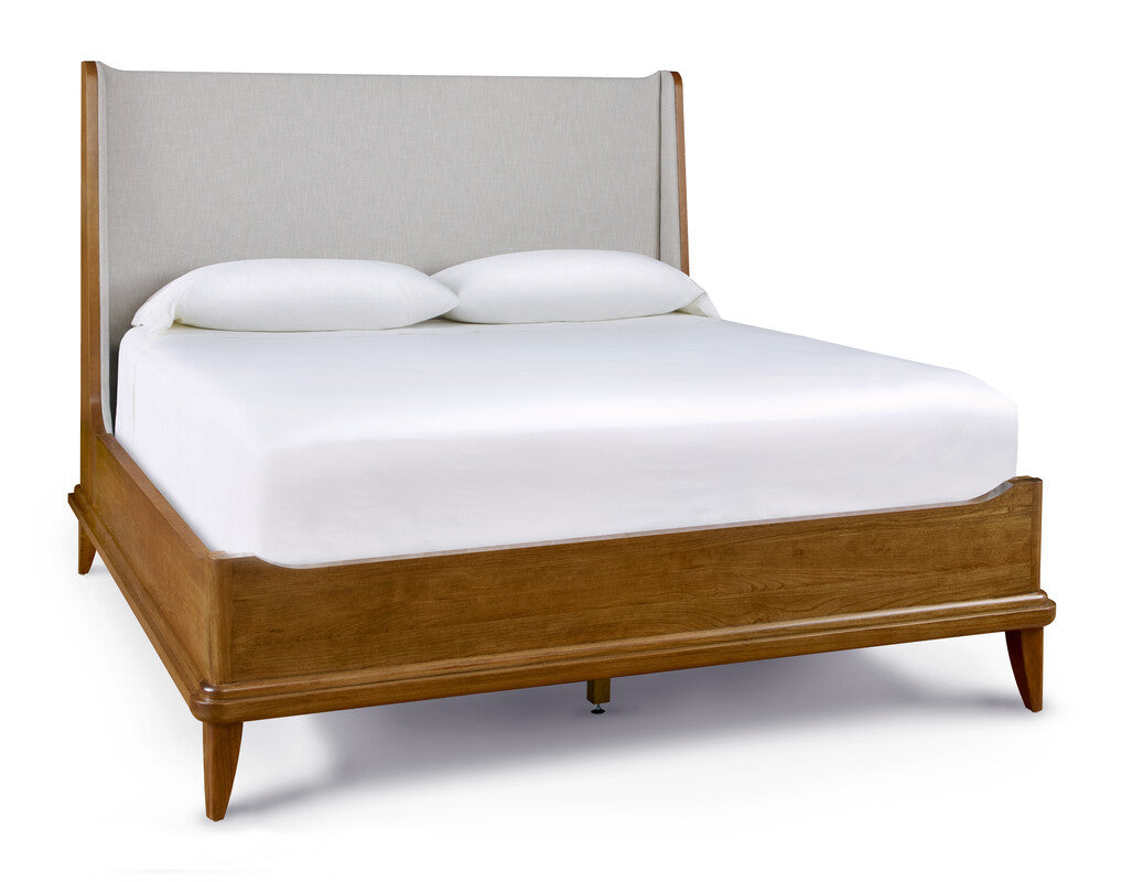 Wooden bed with white bedding and headboard on a white background