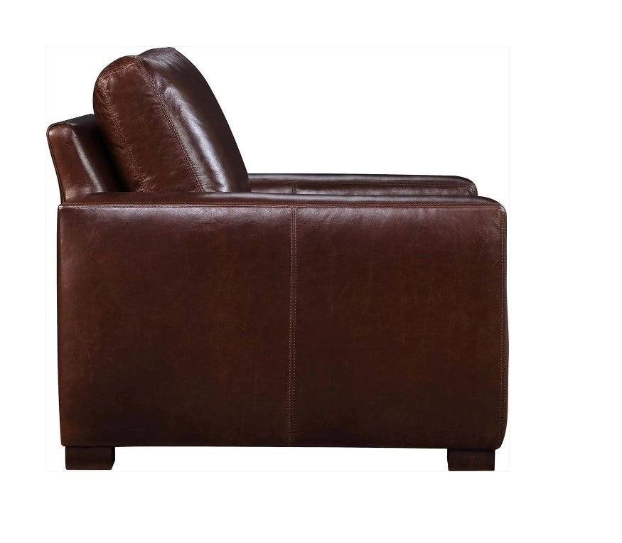 Brown leather armchair on a white background
