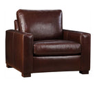 Brown leather armchair on a white background
