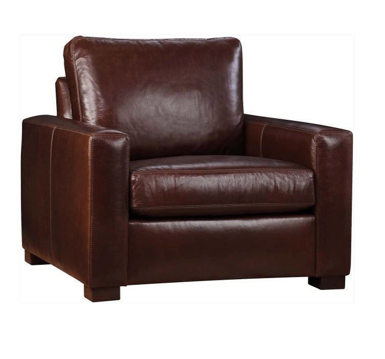 Brown leather armchair on a white background