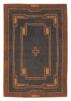 Rug with a cross design and border on a dark blue background