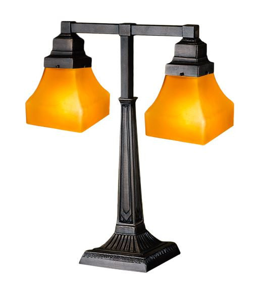 Double lamp with orange glass shades on a white background