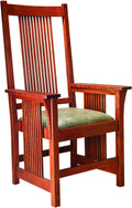 Wooden chair with a green cushion on a white background