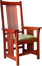 Wooden chair with a green cushion on a white background