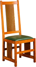 Wooden chair with a green cushion on a white background