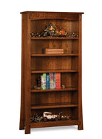 A tall, five-shelf wooden bookcase with a warm medium-brown finish, styled with books, a motorcycle figurine, and a small vintage car on a white background.