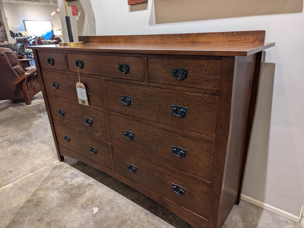 Wooden dresser with multiple drawers in a room setting
