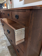 Harvey Ellis Master Dresser by Stickley with open drawer in a room setting