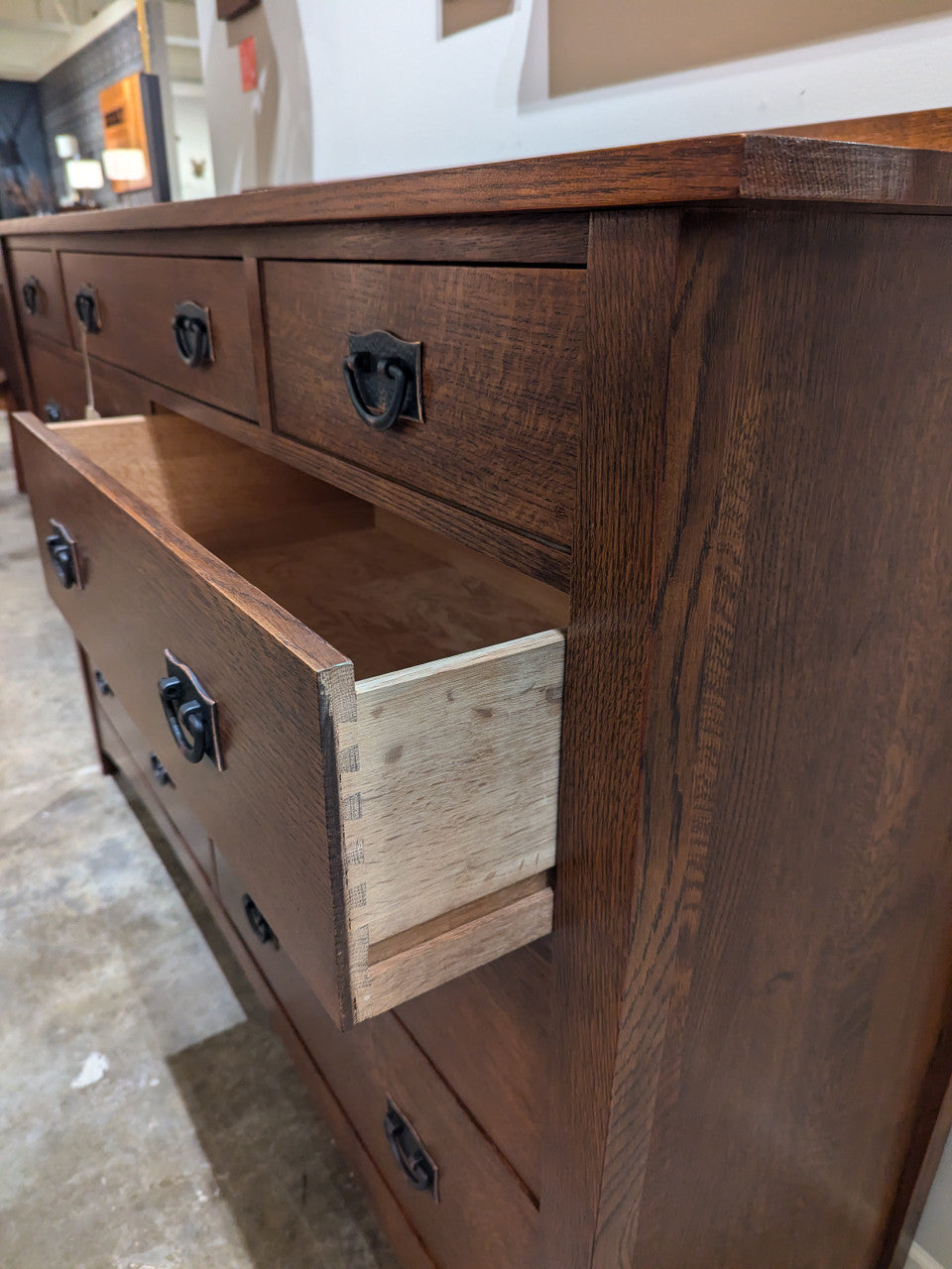 Harvey Ellis Master Dresser by Stickley with open drawer in a room setting