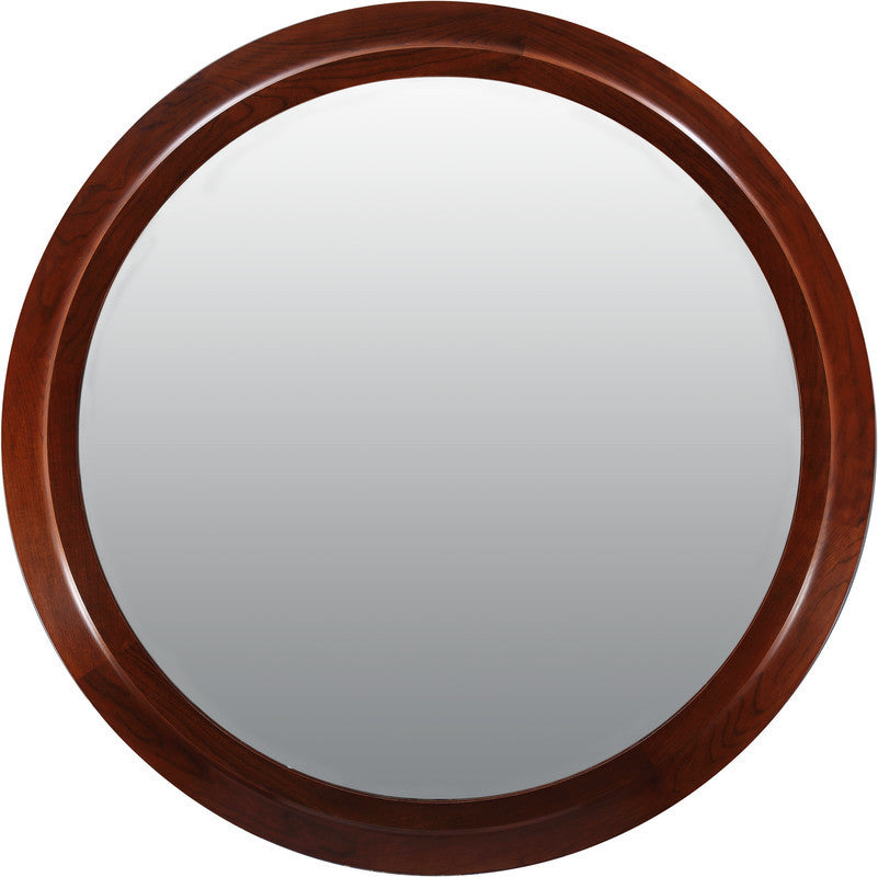 Round mirror with a wooden frame on a white background