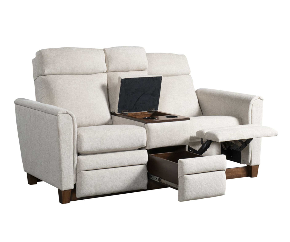 Beige reclining sofa with a laptop on an adjustable tray table on a white background