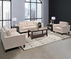 Beige living room furniture set with a coffee table and lamps in a modern room.