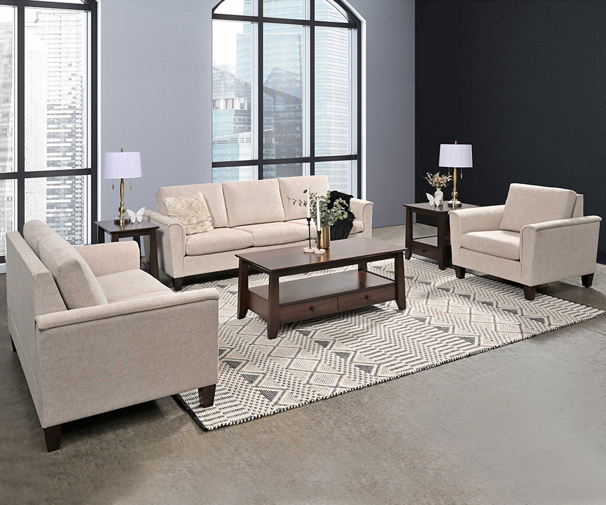 Beige living room furniture set with a coffee table and lamps in a modern room.