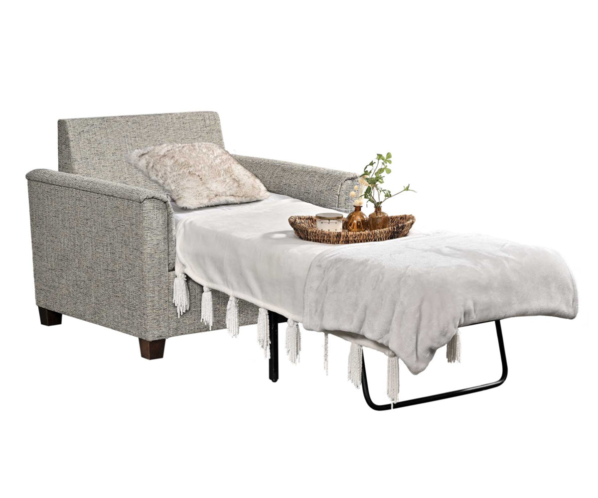 Gray upholstered chair with a white cover and decorative items on a white background