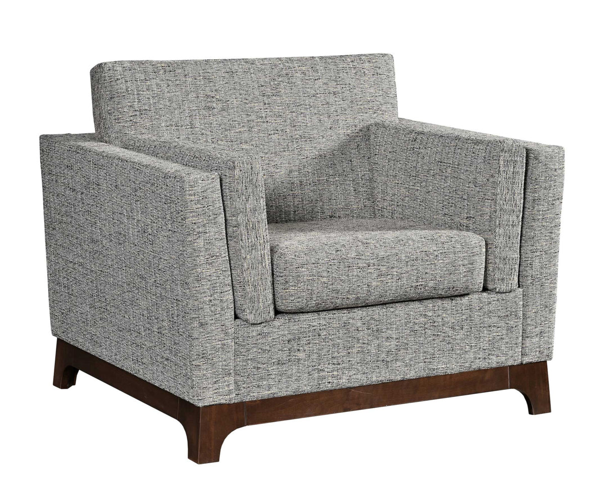 Arm chair in grey fabric on white background.