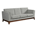 Three seat sofa with gray fabric on a white background. 