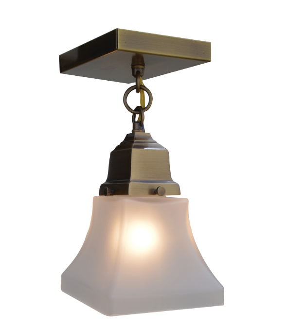 A single-light pendant ceiling fixture with a square satin brass canopy, decorative chain, and a frosted glass shade that glows warm white when illuminated, shown on a plain white background.