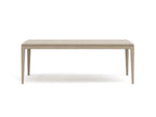 Beige dining table on a white background