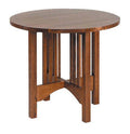 Wooden round table on a white background