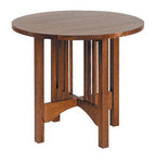 Wooden round table on a white background