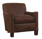 Brown leather armchair with nailhead trim on a white background