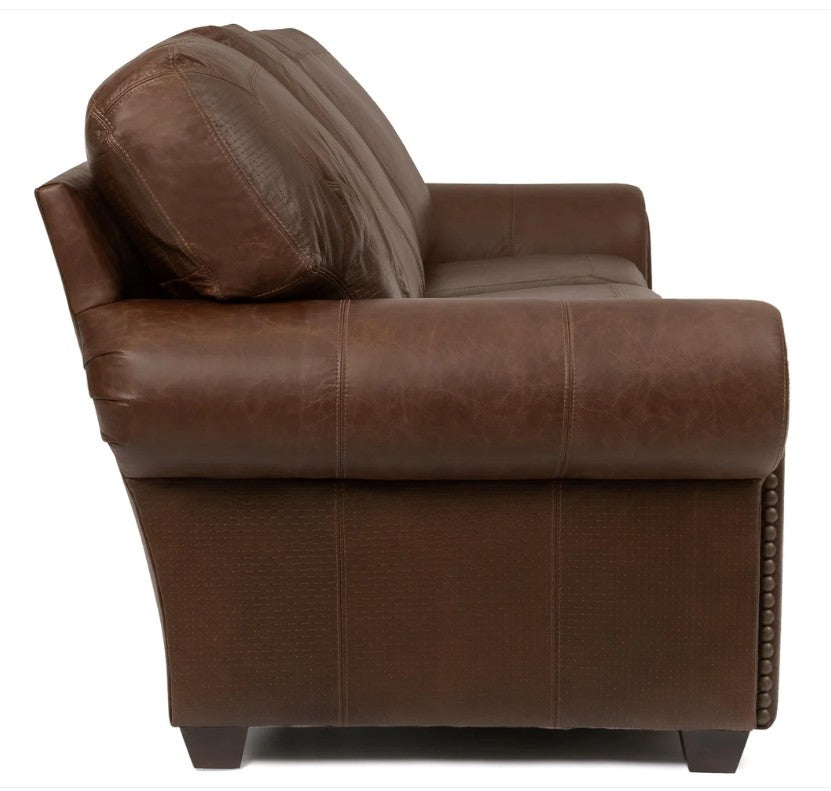 A brown leather loveseat sofa shown from a three-quarter side angle against a plain white background.