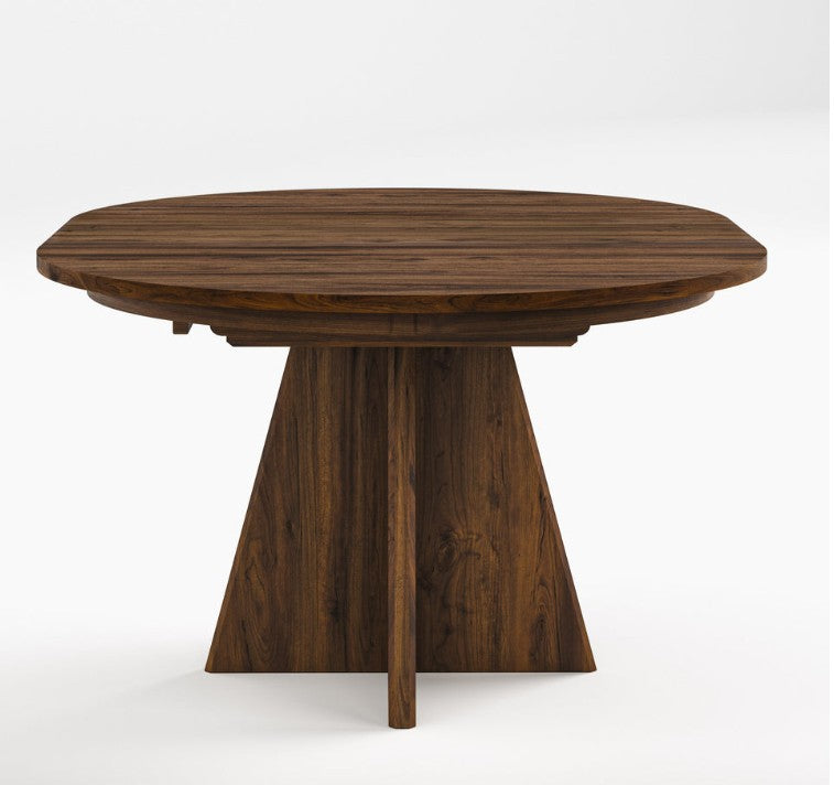 A round wooden dining table with a dark brown wood grain finish, featuring a geometric triangular pedestal base and a drop-leaf design, shown on a light gray background.