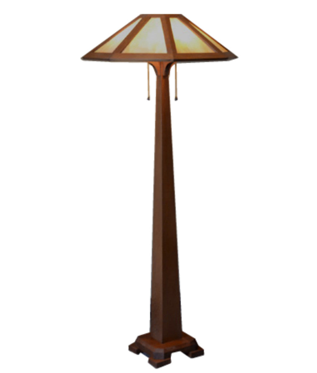 Tall floor lamp with a decorative shade on a white background