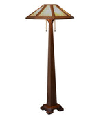 Tall floor lamp with a decorative shade on a white background