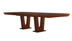 A dark brown wooden dining table with a rectangular top and four blocky, geometric legs, shown against a plain white background.