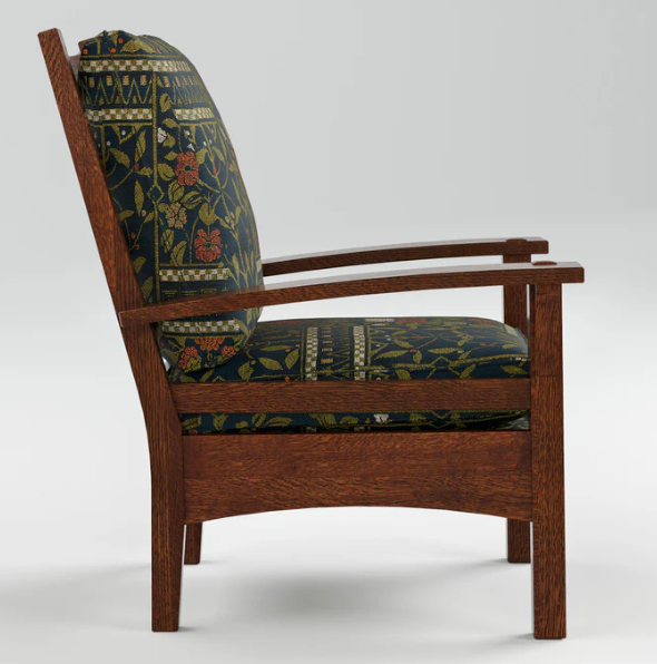 A wooden armchair with a dark wood frame and patterned fabric upholstery in navy blue, olive green, and red floral motifs, shown against a light gray studio background.