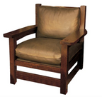 A wooden armchair with a dark brown frame and thick tan cushions, shown against a plain white background.
