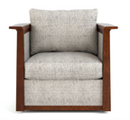 A modern armchair with textured light gray fabric upholstery and a dark brown wood frame, shown against a plain white background.