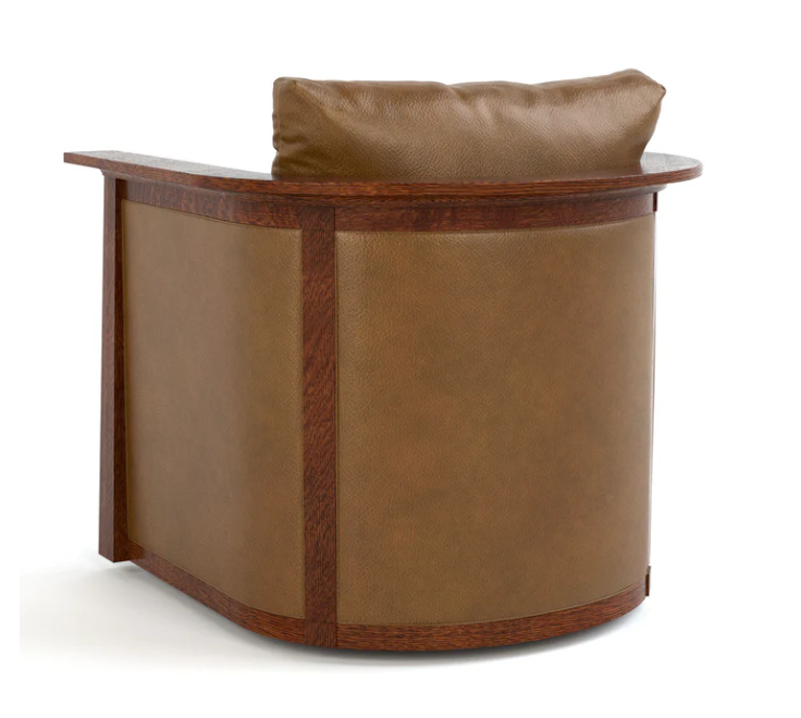 A curved brown leather armchair with dark wood trim and a matching brown back cushion, shown on a plain white background.