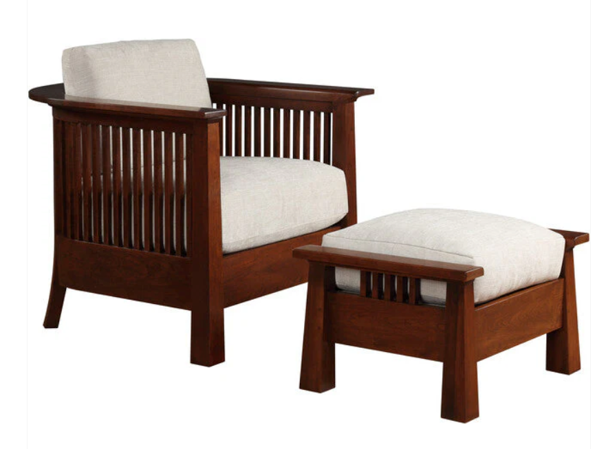 A wooden armchair with a matching ottoman, both featuring cream-colored seat and back cushions, shown against a plain white background.