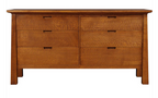 A mid-century modern wooden dresser with six drawers, featuring a warm medium-brown finish and dark wood pull handles, isolated on a white background.