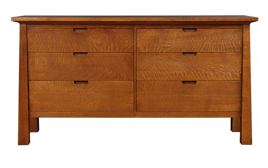 A mid-century modern wooden dresser with six drawers, featuring a warm medium-brown finish and dark wood pull handles, isolated on a white background.