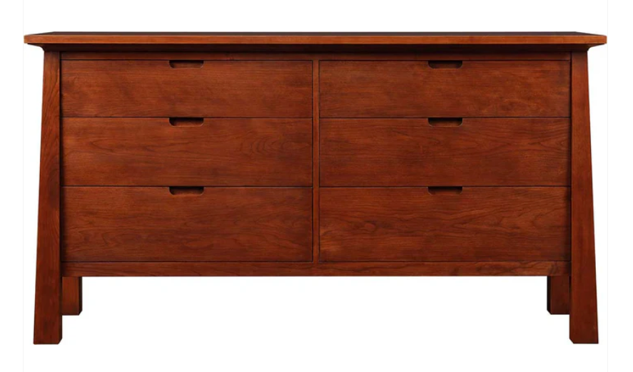 A six-drawer wooden dresser with a warm reddish-brown finish and dark metal pull handles, shown against a plain white background.