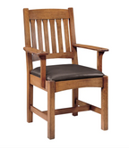 A wooden dining chair with a slatted backrest, wide armrests, and a dark brown upholstered seat cushion, shown on a plain white background.