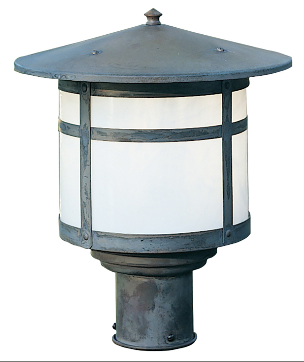 A classic outdoor post cap light fixture with a weathered dark gray metal frame and a white frosted glass shade, isolated on a white background.