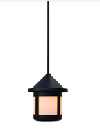 A single hanging pendant light with a matte black metal frame and a warm glowing frosted glass shade, suspended by a slim black cord against a plain white background.