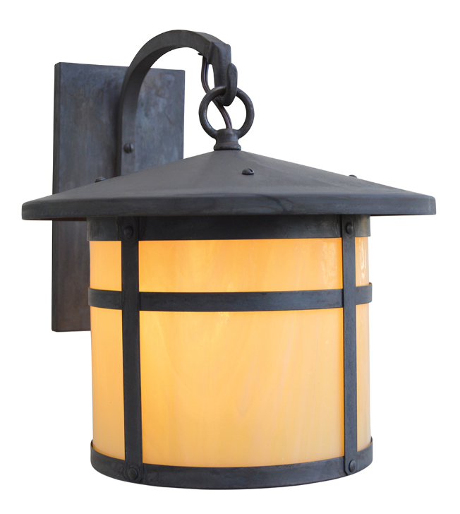 A single outdoor wall sconce with a dark metal frame and a warm yellow-orange frosted glass shade, shown against a plain white background.