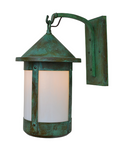 A vintage-style outdoor wall sconce with a distressed green and bronze metal body, featuring two frosted white glass panels on a white background.