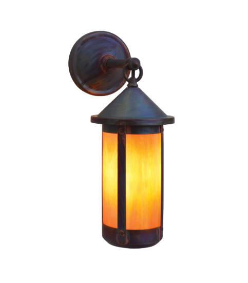 A rustic outdoor wall sconce with a dark bronze-finished metal frame and a warm orange glowing glass shade, shown against a plain white background.