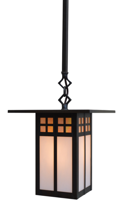 A black metal pendant lantern with frosted white glass panels and warm orange light glowing from within, suspended by a matching black rod against a solid white background.